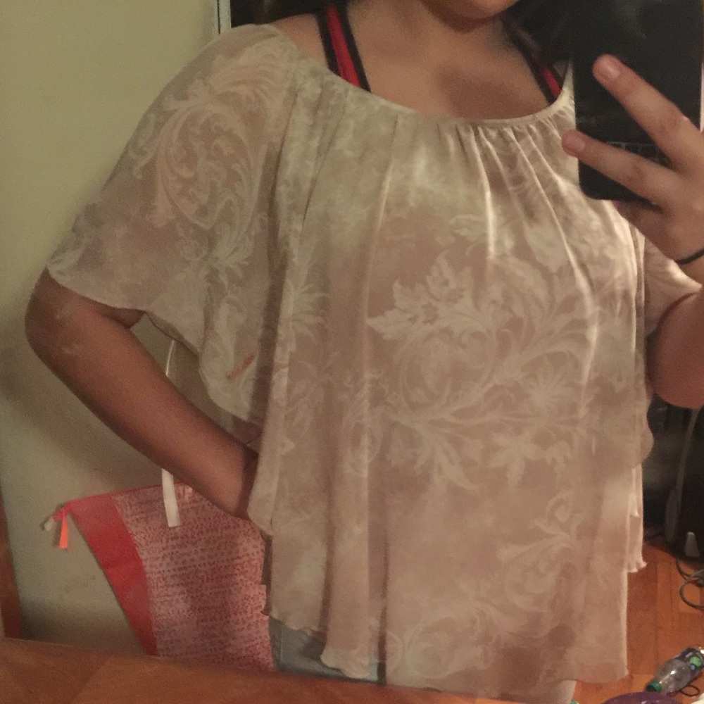 Cute cream color elegant blouse with open sides